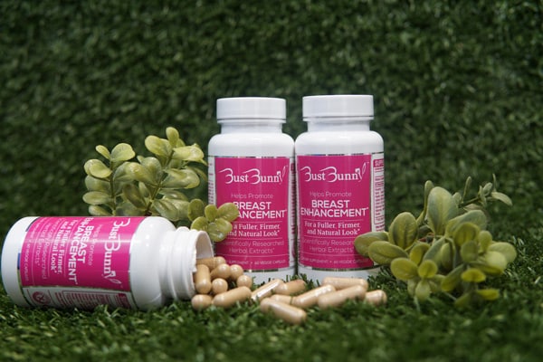 Bust Bunny Breast Enhancement bottles, pills on lawn