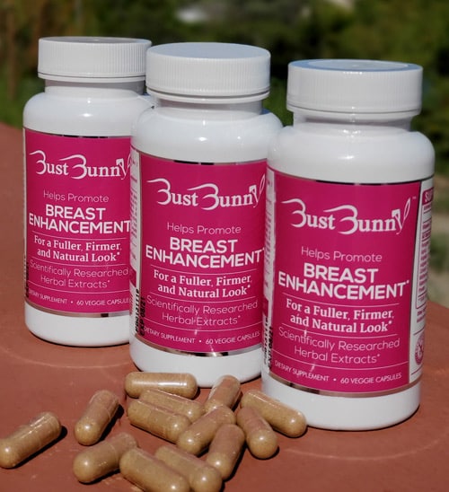 three bottles of breast enhancement supplements