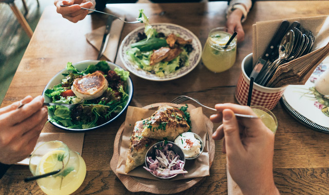 group of people eating healthy meal