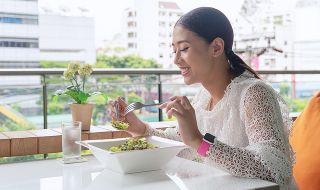 woman eating healthy meal