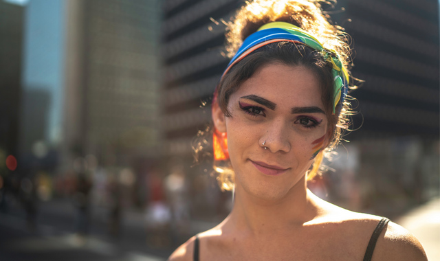 smiling transgender looking at camera