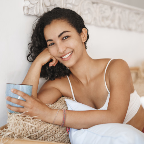 happy, healthy, relaxed woman drinking water
