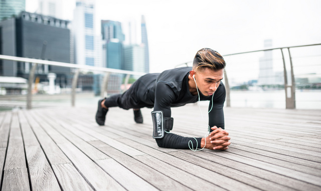 fitness male doing plank position