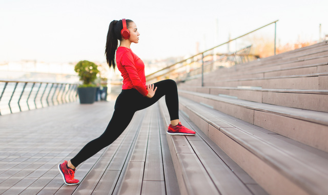 young woman exercising outside