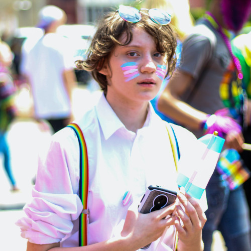 young man holding smartphone