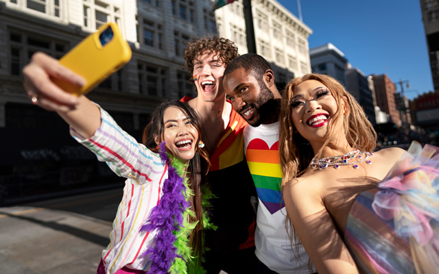 diverse group of friends taking a selfie